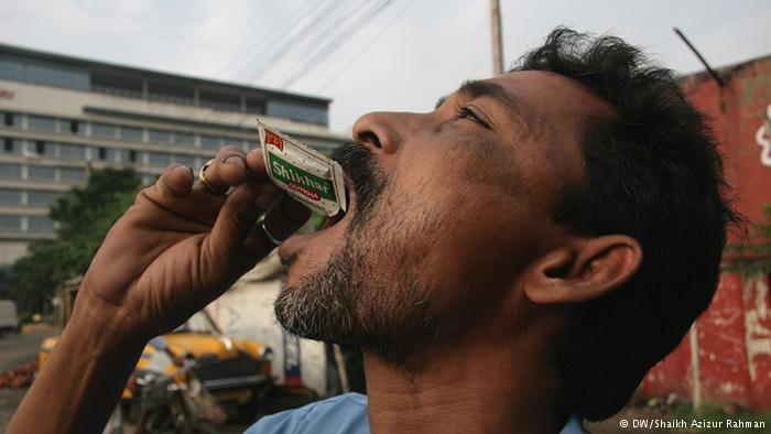 Man eating Tobacco